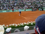 Nicholas Muhat serving